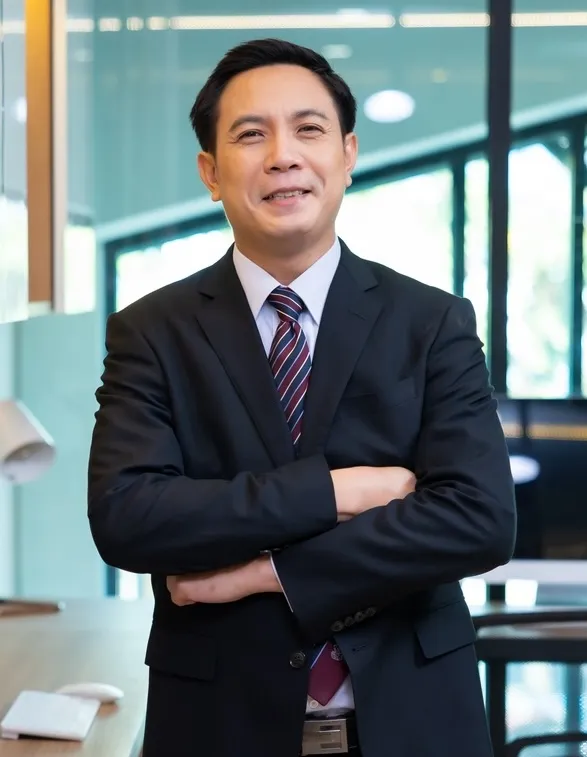 Healthcare executive standing in a practice office