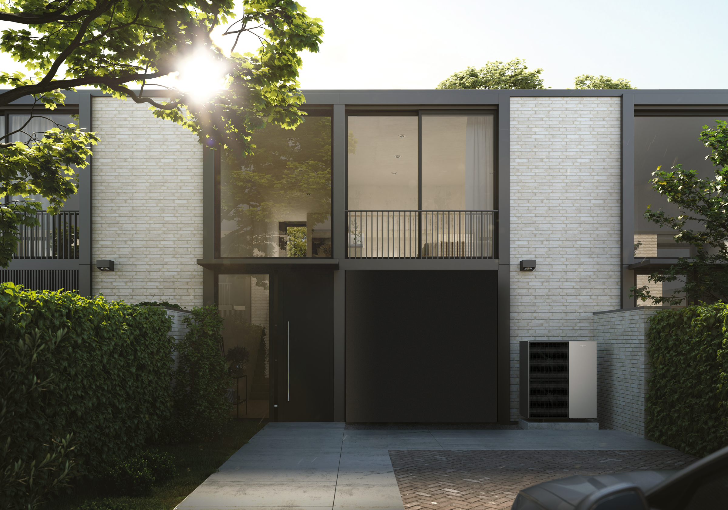 Neubau mit Viessmann Wärmepumpe vor dem Eingang