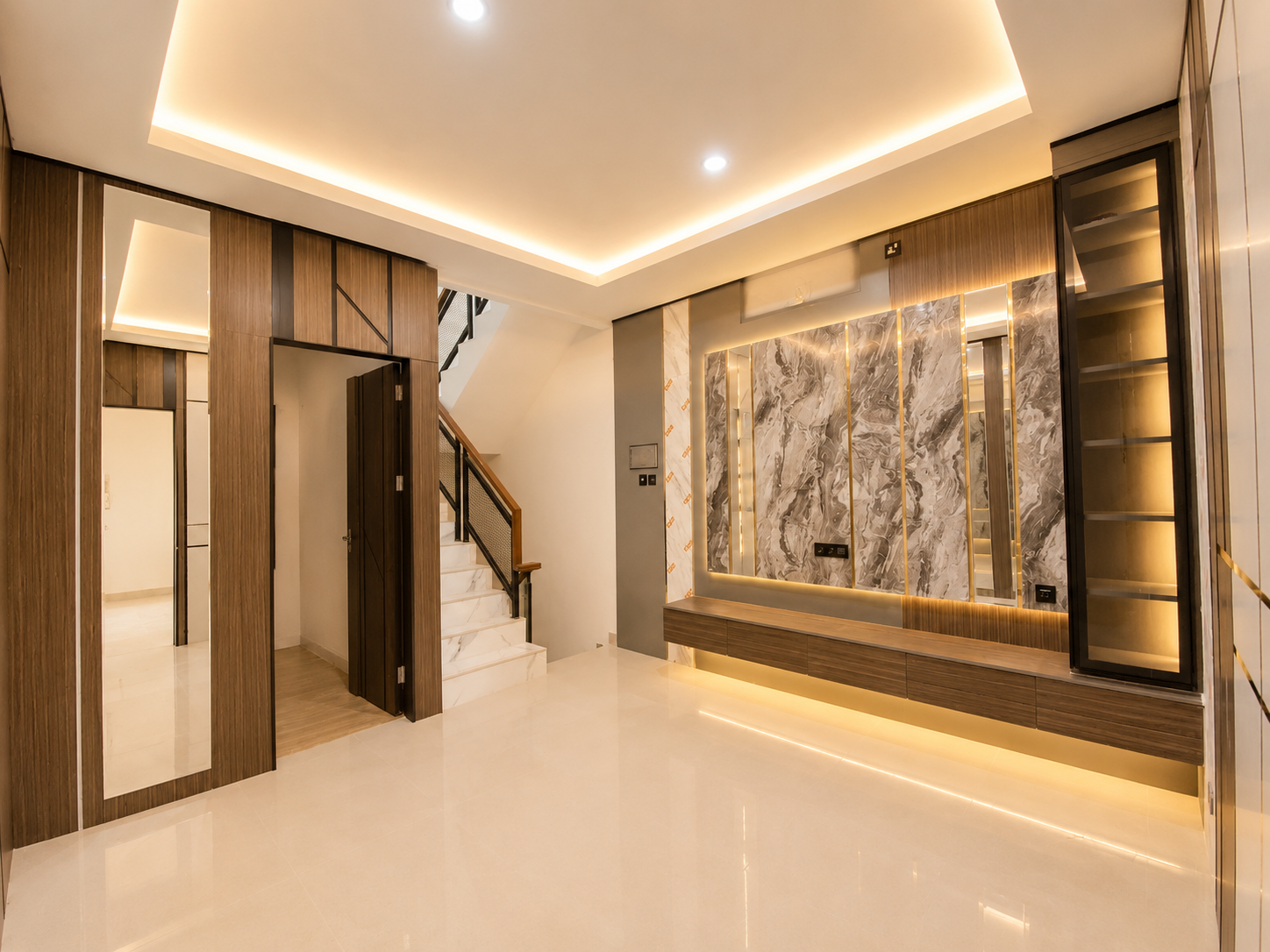 The Refined Modern Interior with a custom marble feature wall showcases luxurious modern design, incorporating the custom marble feature, wood accents, and warm lighting to create an elegant and timeless atmosphere.