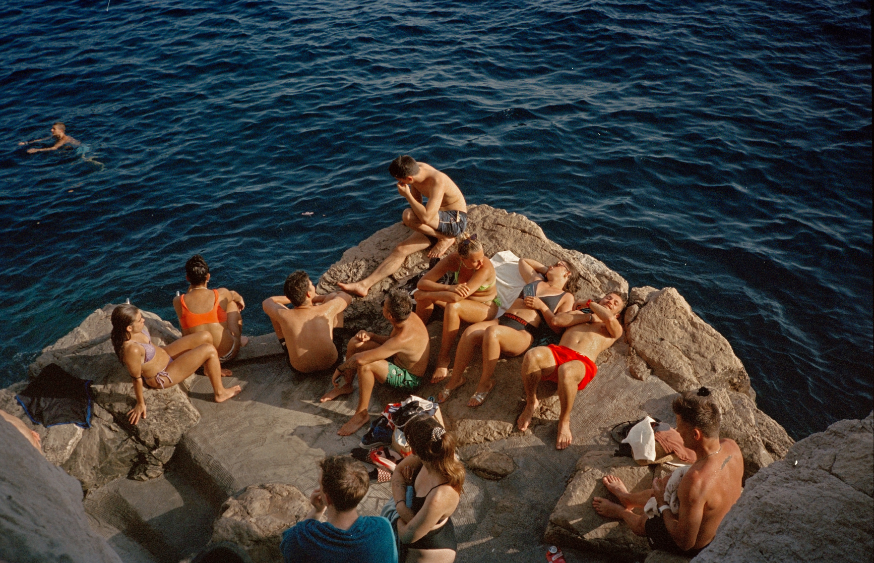 People chilling by the ocean