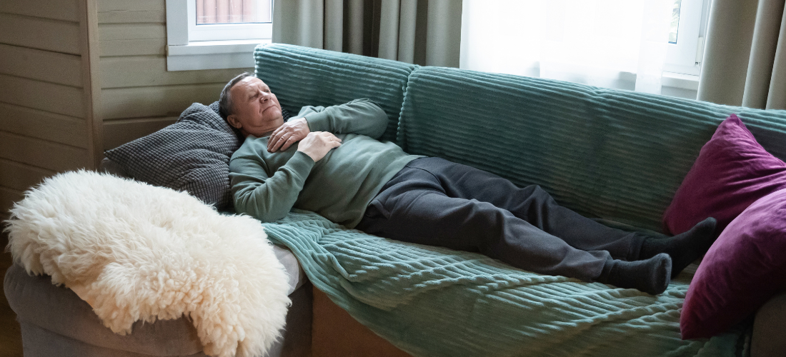 CareTag emergency ID kit showing a black NFC-enabled wristband and blue emergency ID card resting on a smartphone, used to access vital medical information in emergencies.