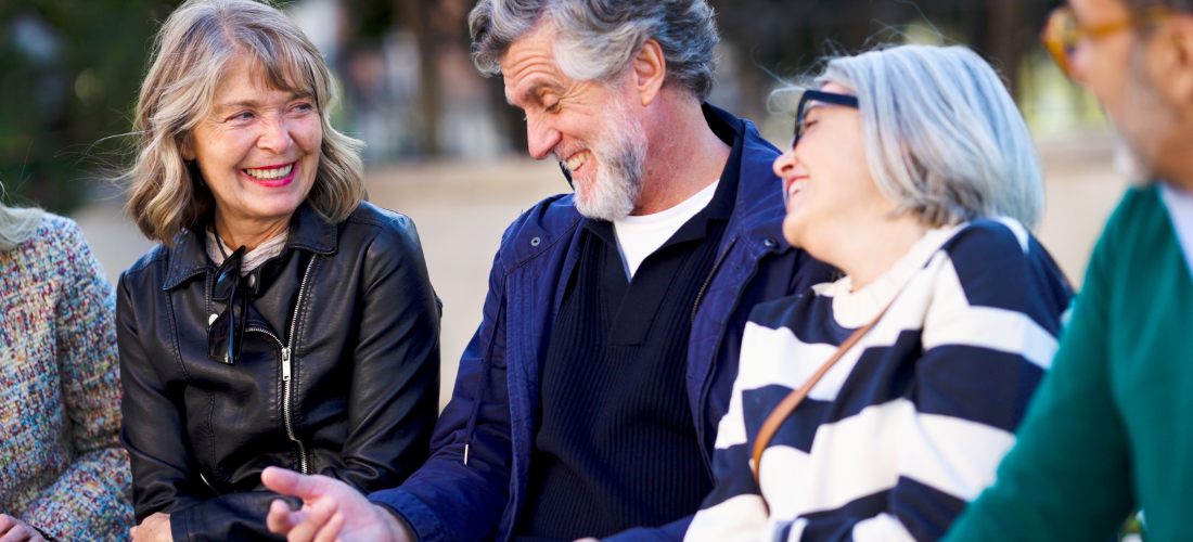 CareTag emergency ID kit showing a black NFC-enabled wristband and blue emergency ID card resting on a smartphone, used to access vital medical information in emergencies.