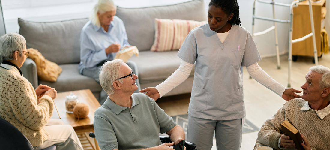 CareTag emergency ID kit showing a black NFC-enabled wristband and blue emergency ID card resting on a smartphone, used to access vital medical information in emergencies.
