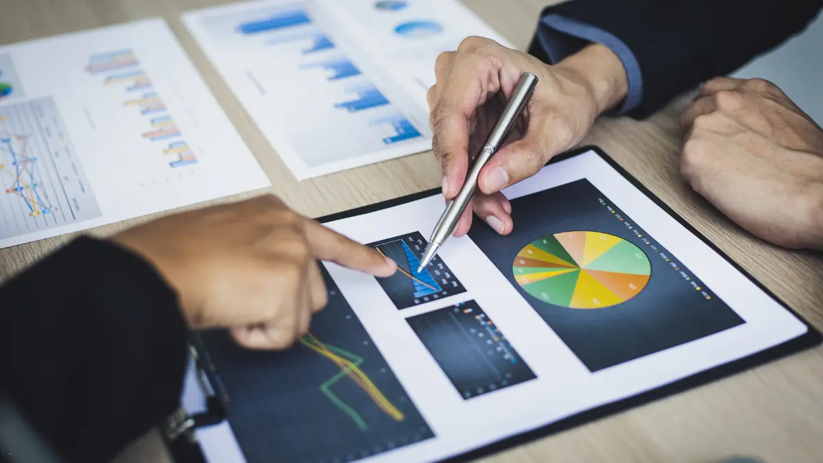 Third-party risk management strategy being analyzed through colorful business charts and graphs.