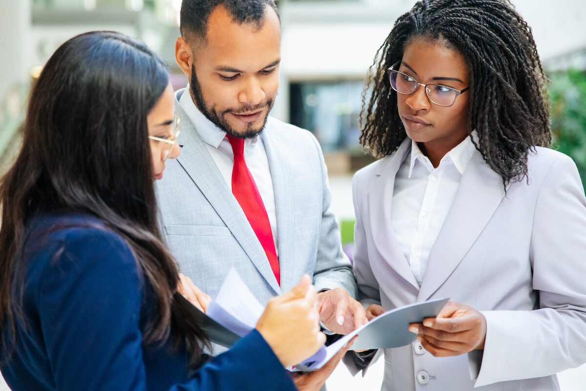 Integrated risk management: managers reviewing documents