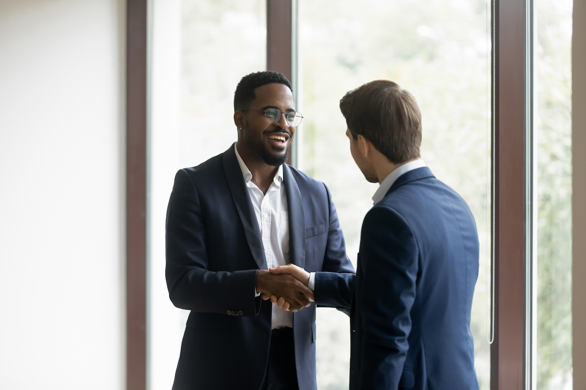 Team members shaking hands