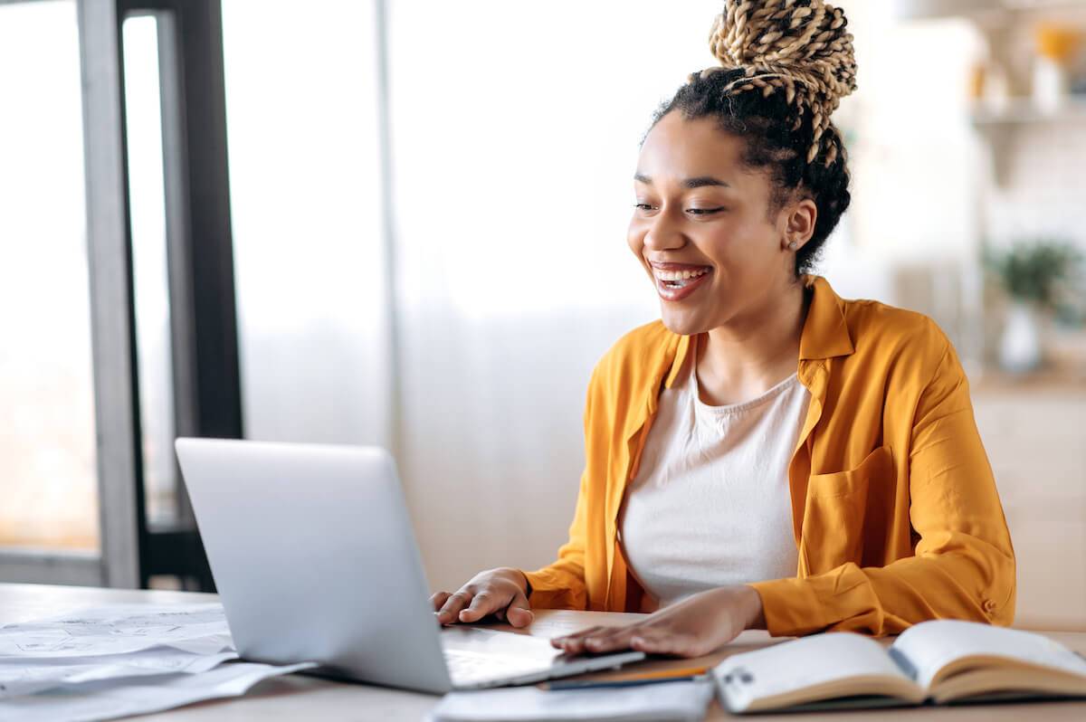 KYC verification: entrepreneur happily working