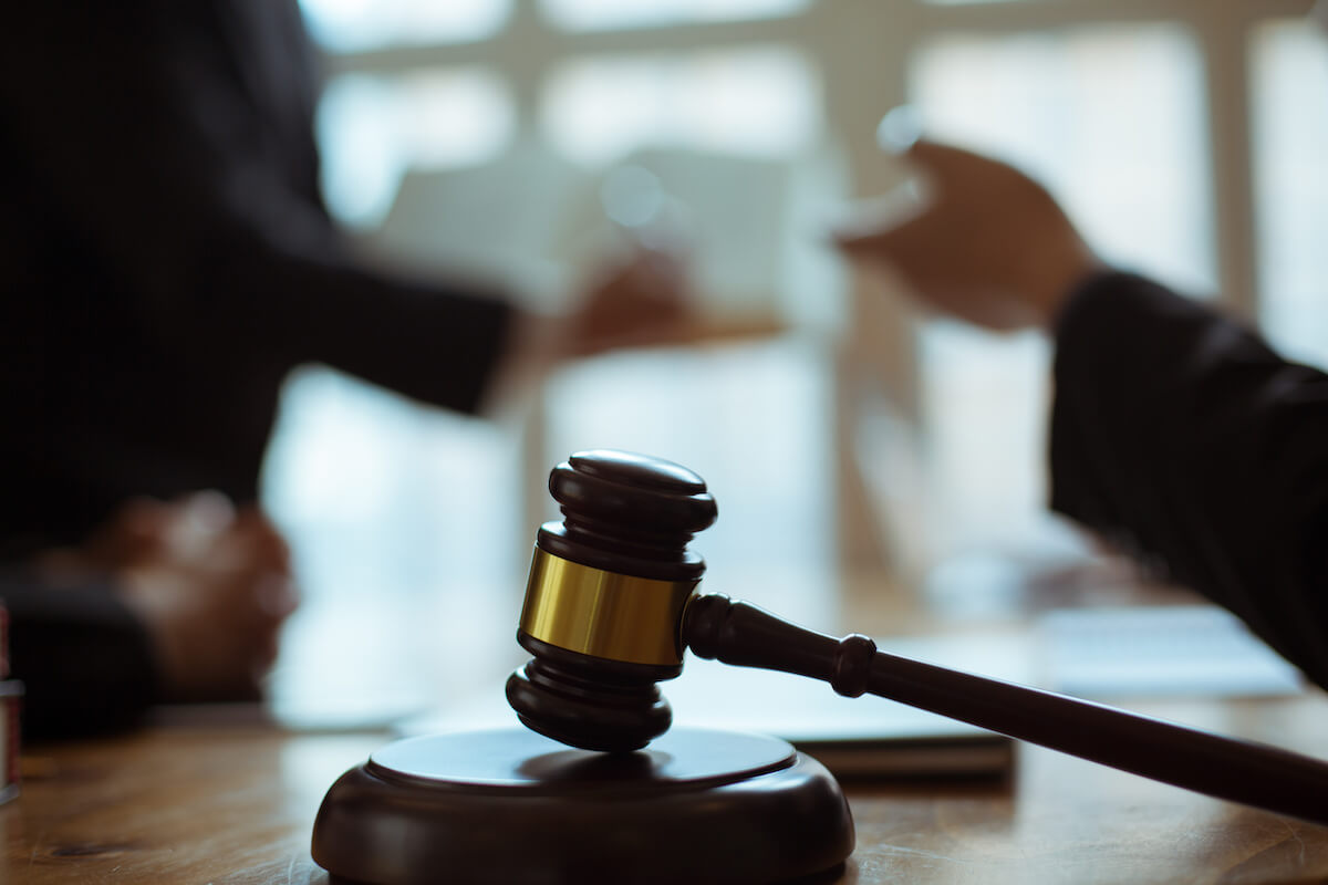 Politically exposed person: gavel and a mallet on a table