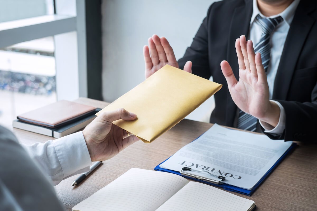 Politically exposed person: entrepreneur refusing to take a bribe
