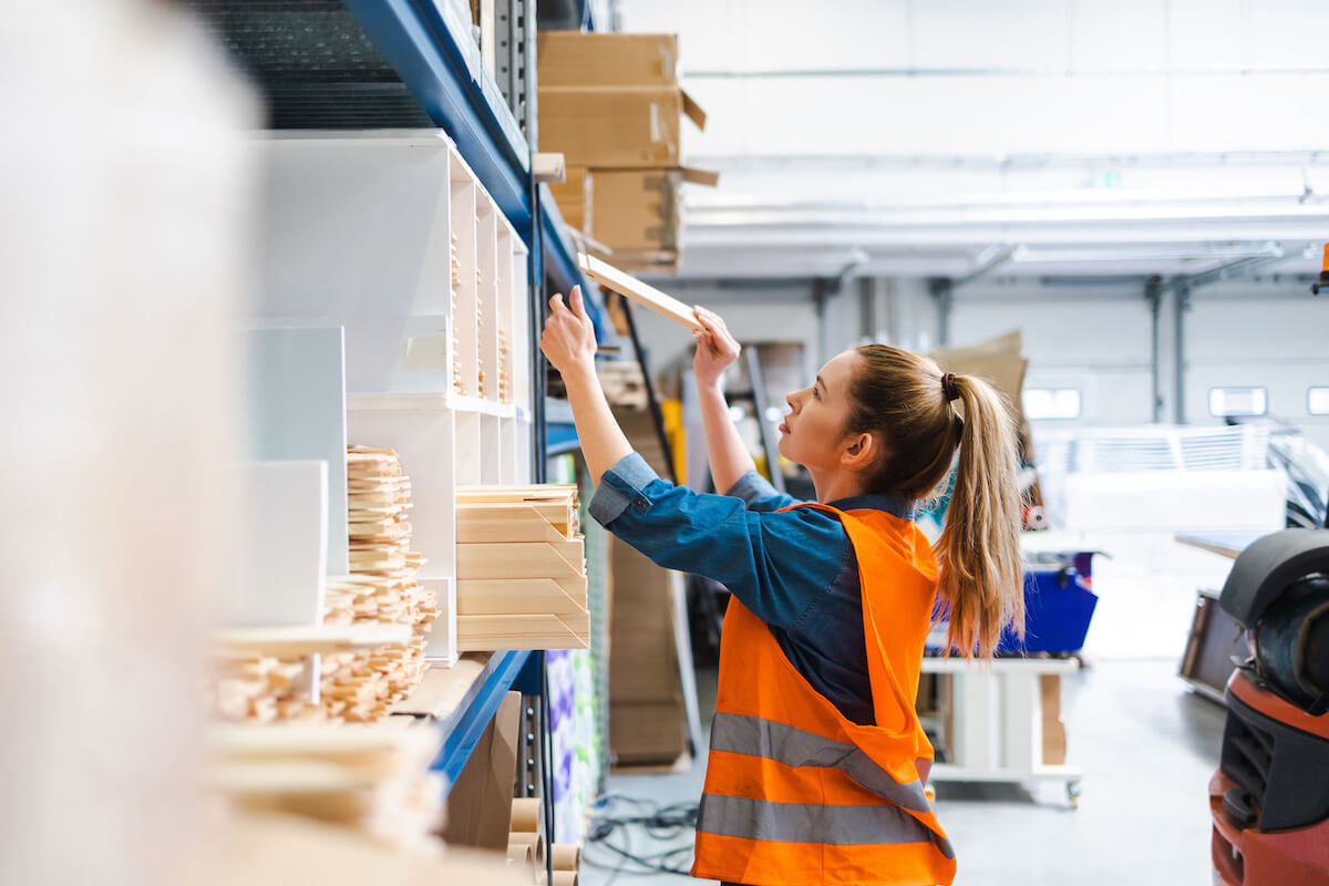 Climate risk: woman working at a warehouse