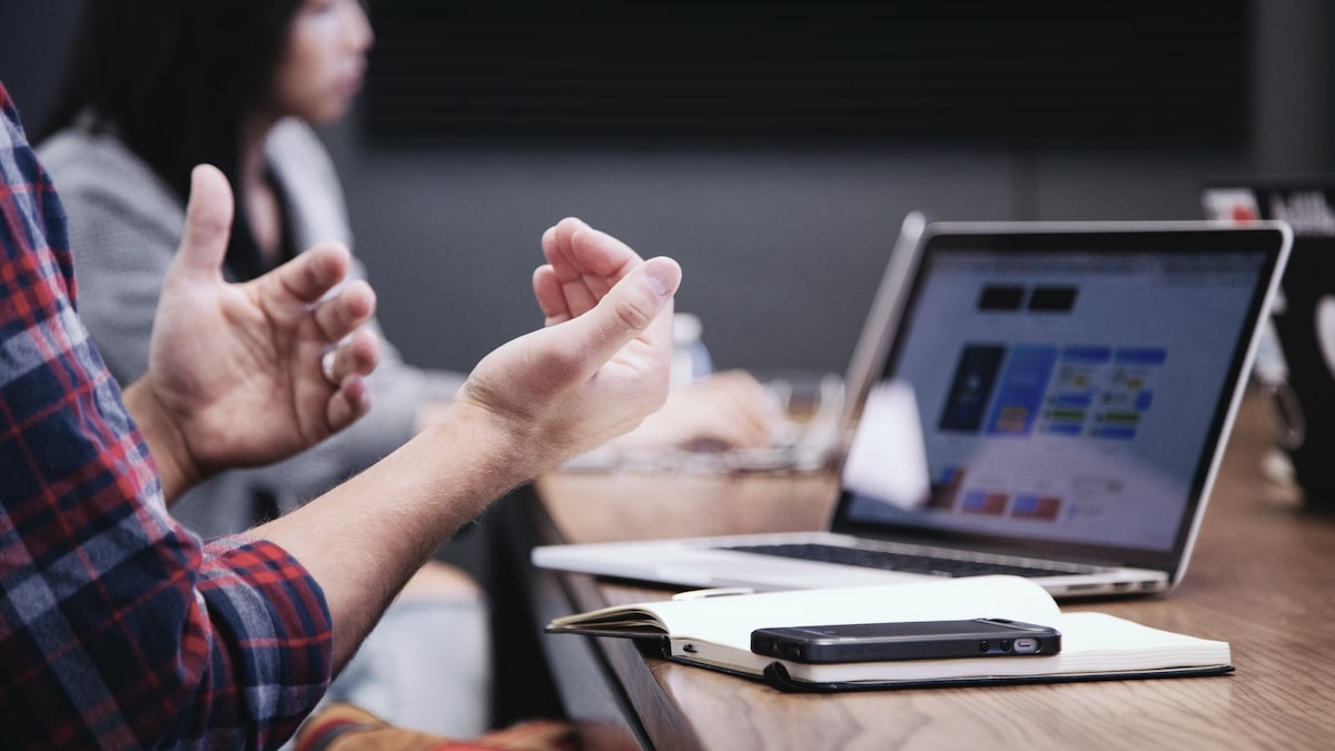 SFDR regulations: employee attending a meeting