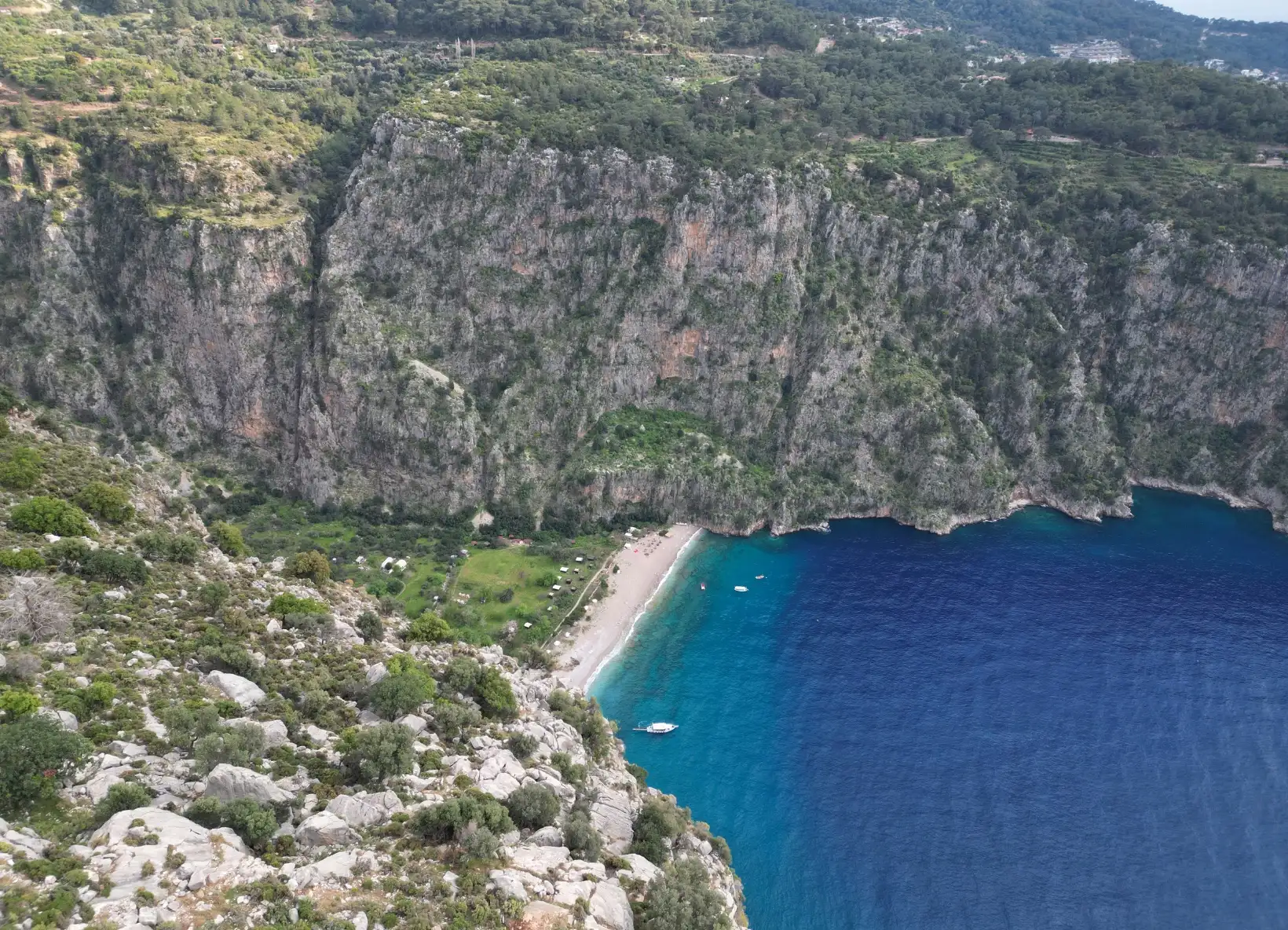 Discover Butterfly Valley in Ölüdeniz, Turkey. A hidden paradise with steep cliffs, turquoise waters, and breathtaking natural beauty along the Lycian Way.