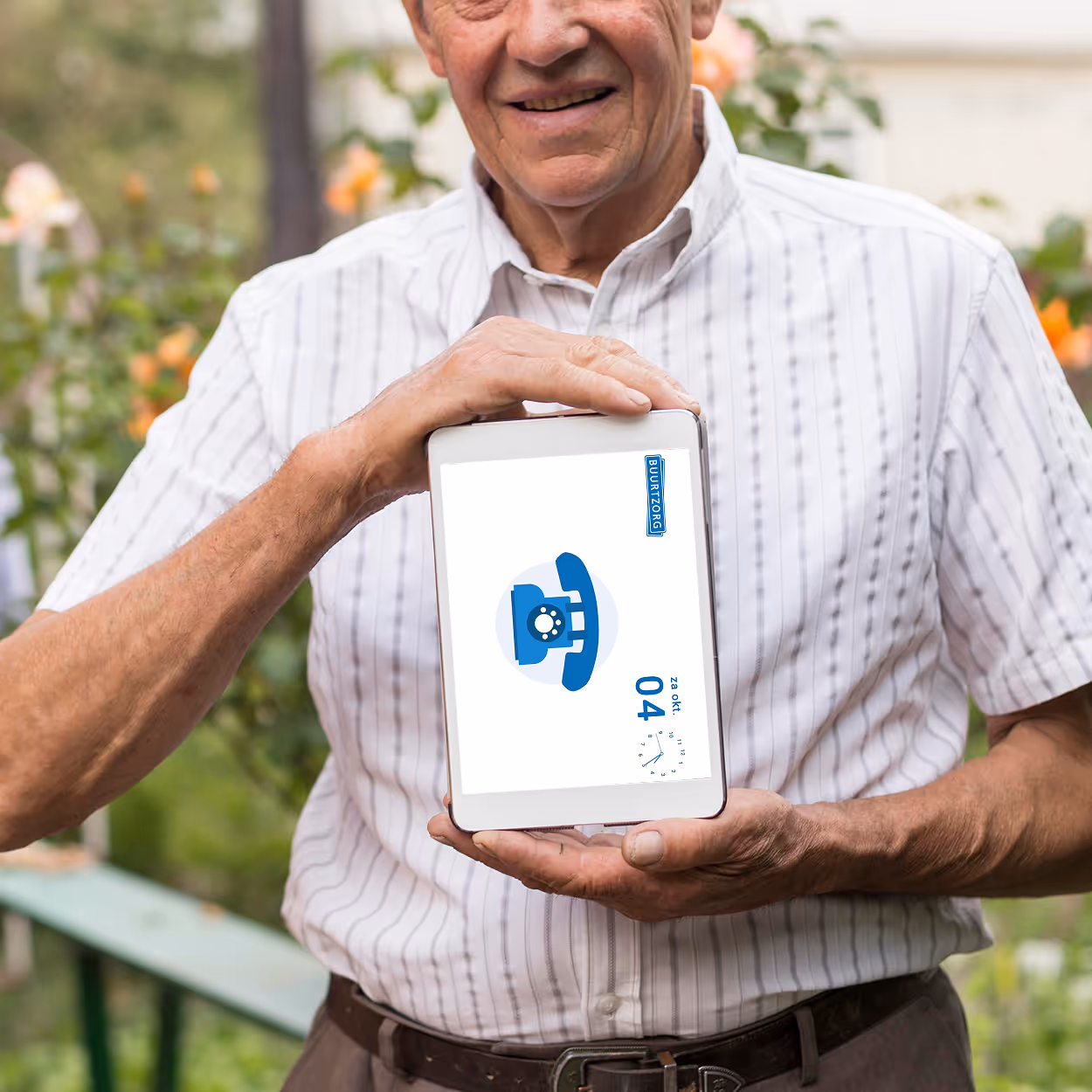 An older man is holding a table with Zuster Annie in it.