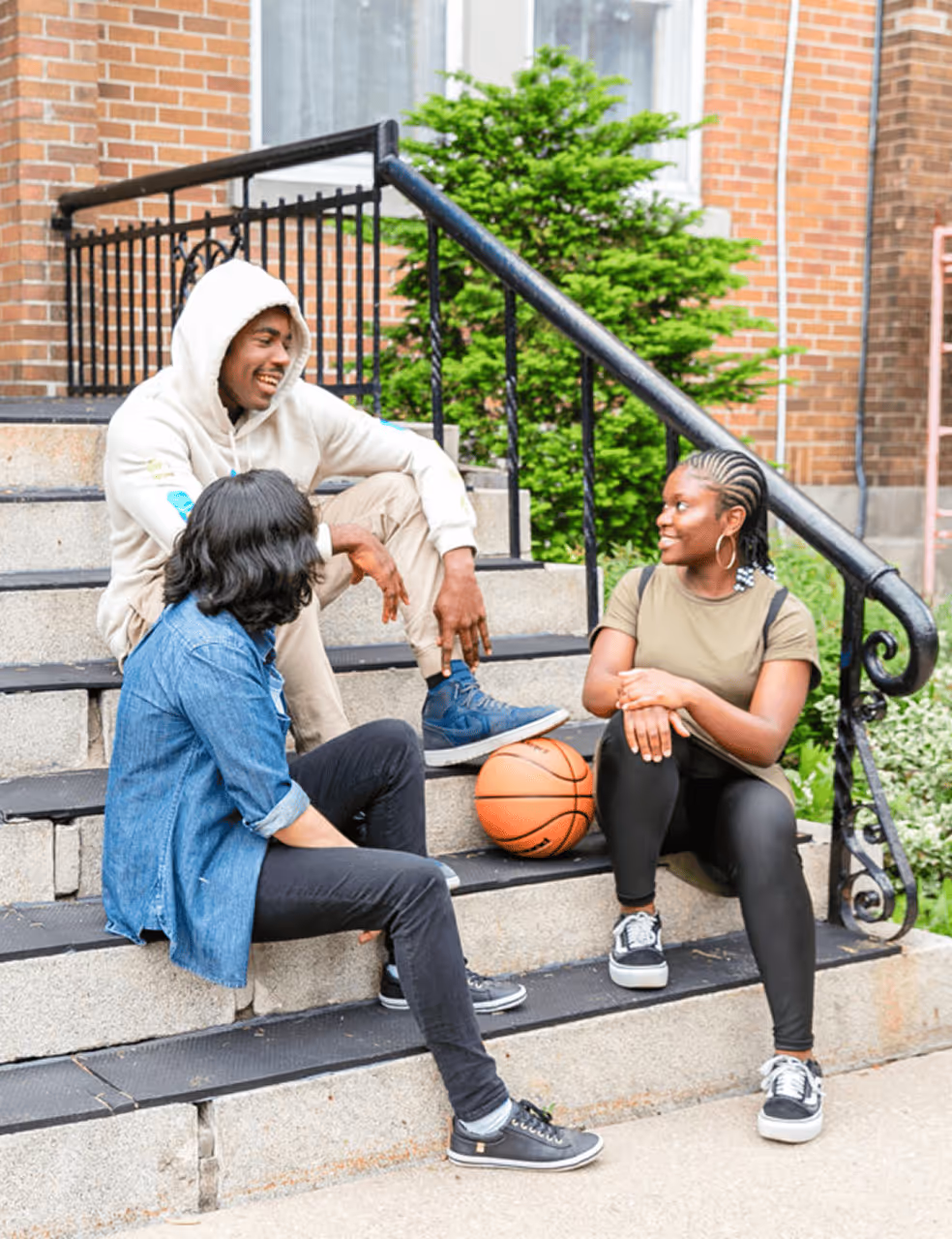 Young people discussing and smiling - AMDF