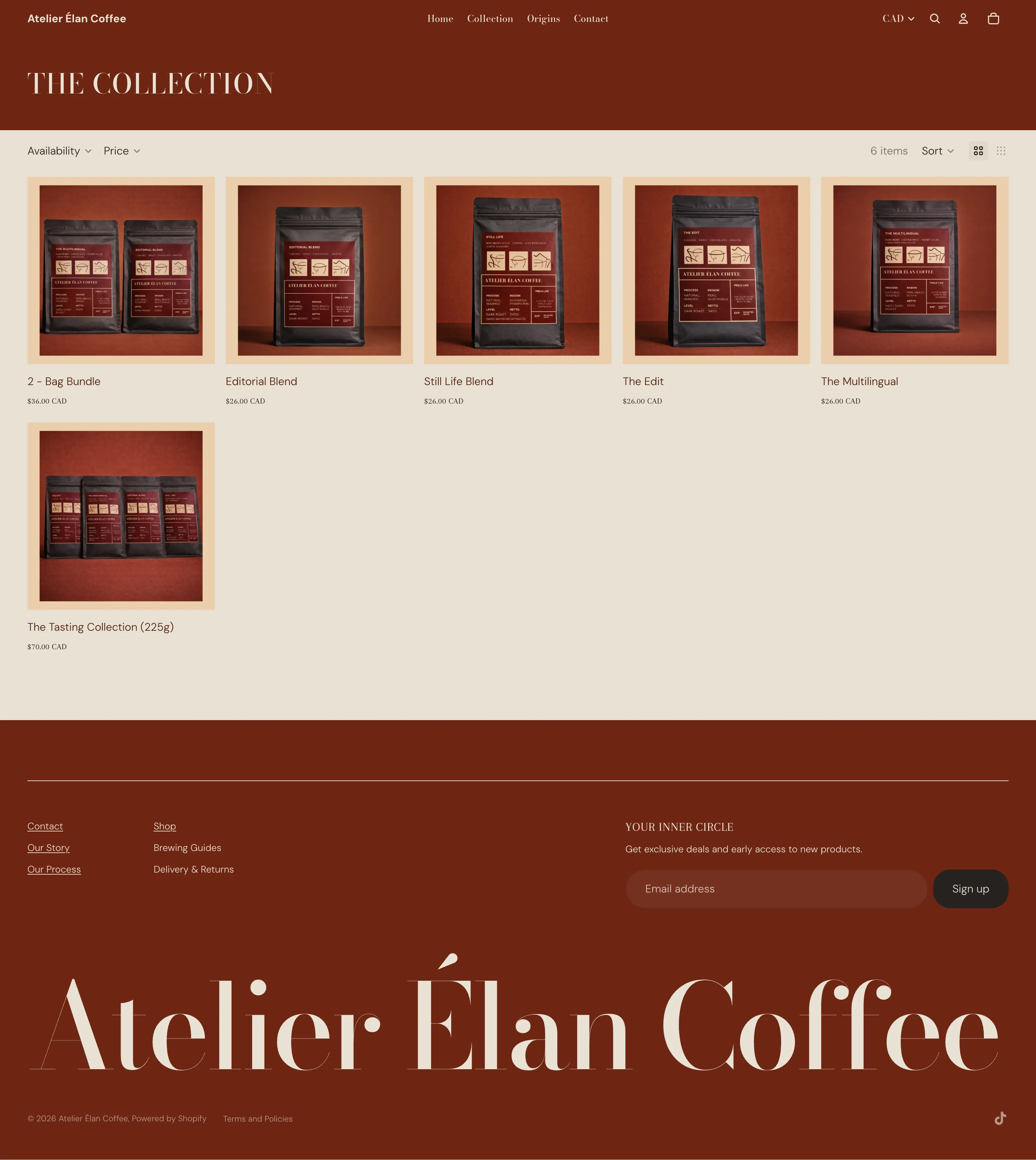 Atelier Élan Coffee collection page showing six coffee blend products in a clean grid layout against a warm burgundy background
