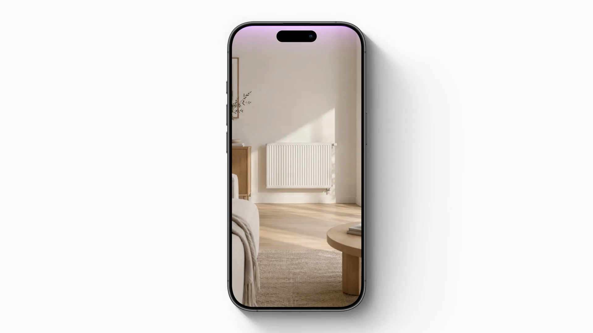 Smartphone zeigt durch die Kamera einen Heizkörper in einem hellen Wohnzimmer, bereit für den Scan