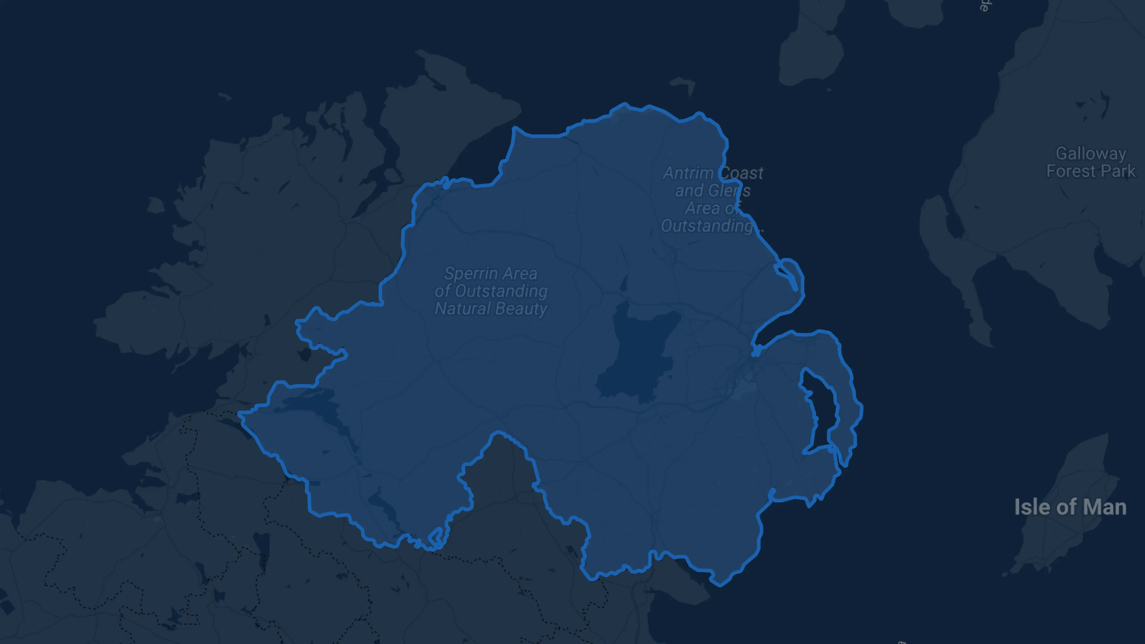 A dark theme map highlighting the geographical location of Northern Ireland in relation to surrounding countries and bodies of water.