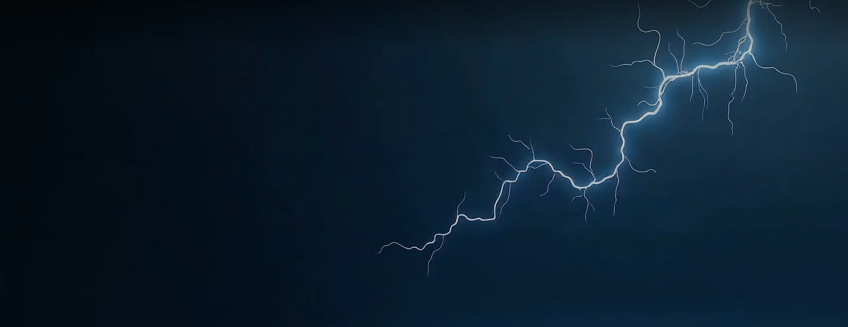A blue lightning bolt striking against a blue background.