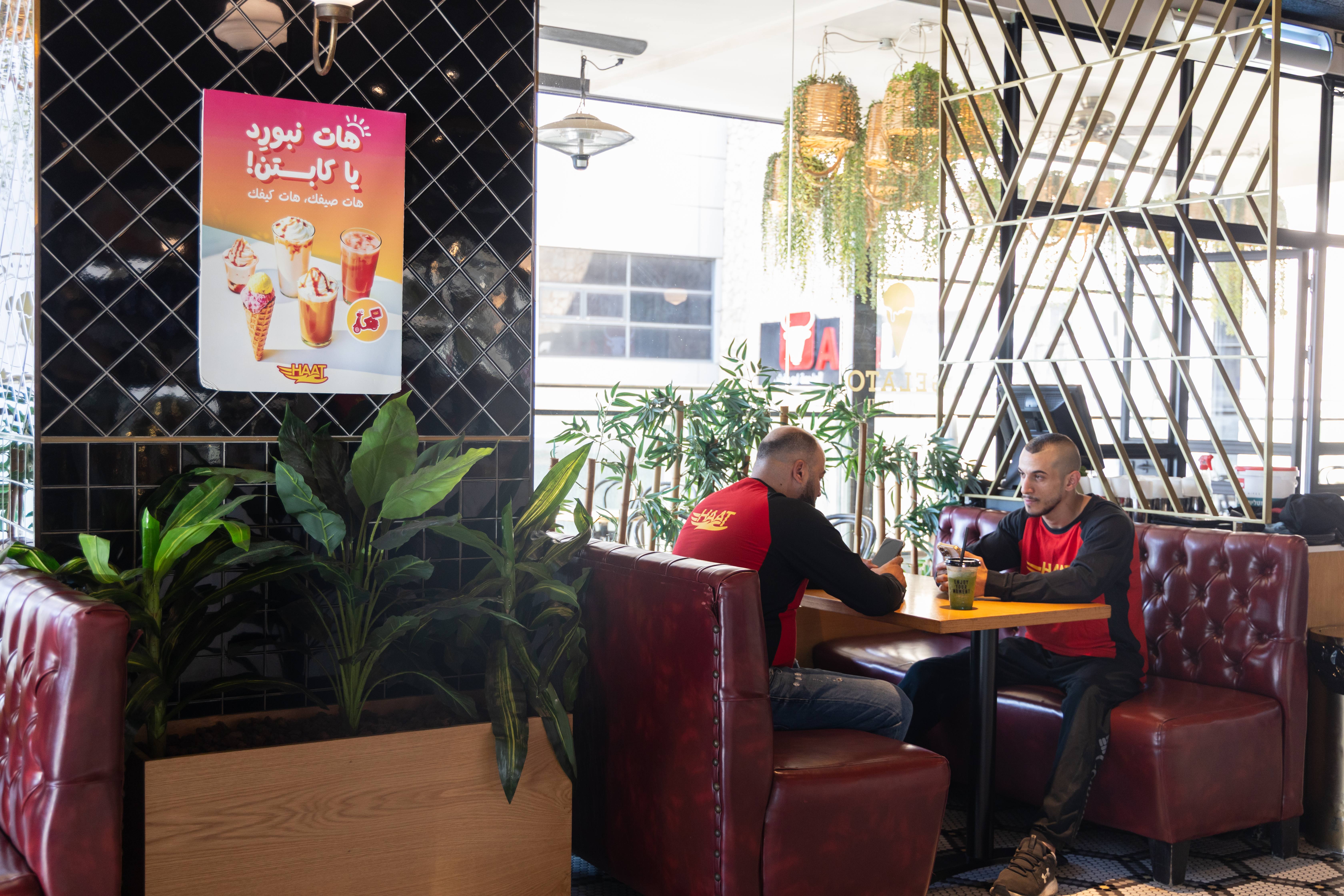 Couriers enjoying cold fresh drinks in the heat of summer 