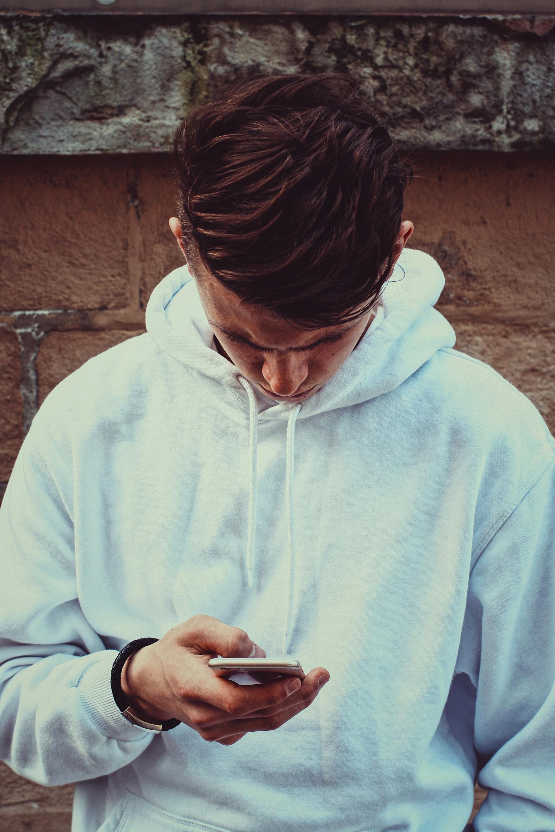 Boy on phone.