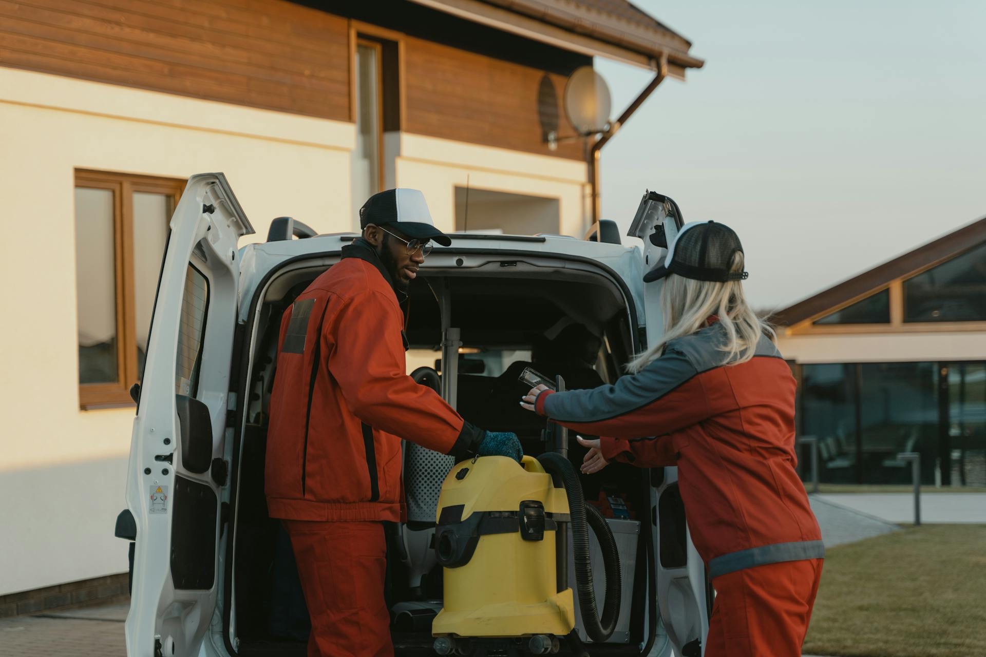 Service Providers loading things in truck. 