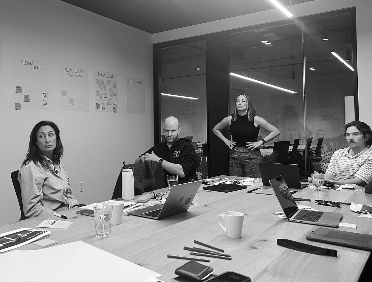 A black and white photo of RVNU Strategy Workshop in progress