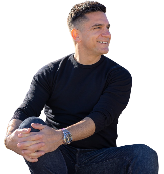 Chris Tonich standing in front of a luxury home in City Beach Perth