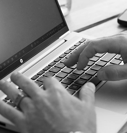 Chris Tonich Perth real estate agent working on a new listing in the Western suburbs