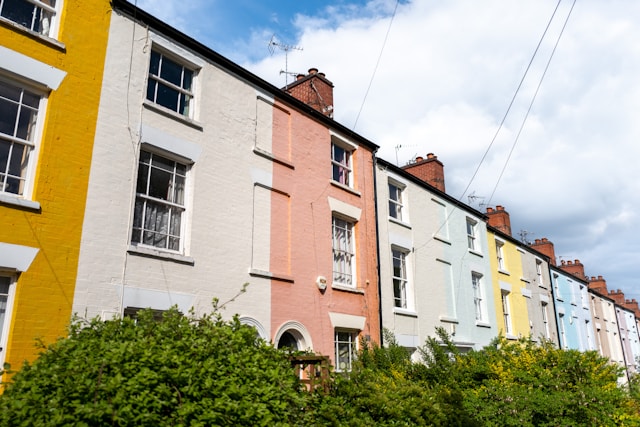 A row of brightly coloured terraced housing