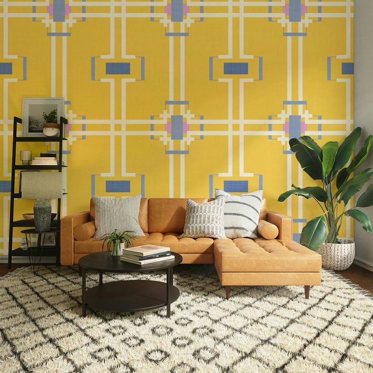 This may contain: a living room with yellow and blue wallpaper