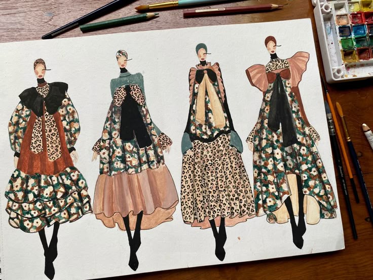 This may contain: an artist's drawing of three different dresses