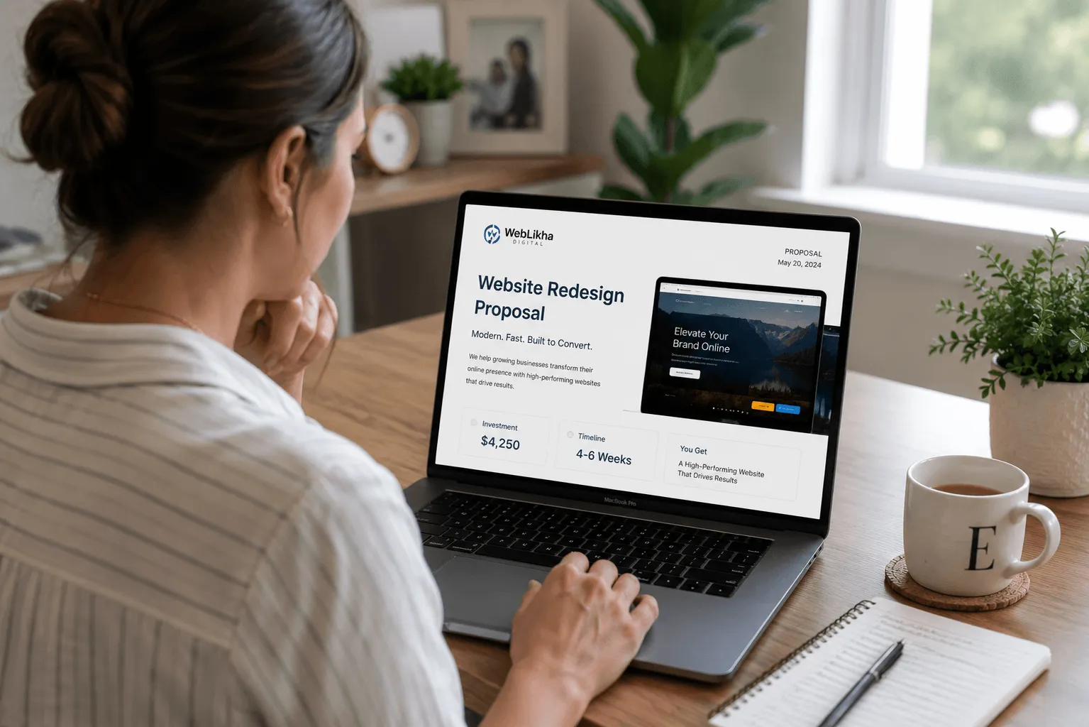 A U.S. business owner reviewing a web development proposal on a laptop, showing the decision-making moment that readers are going through.