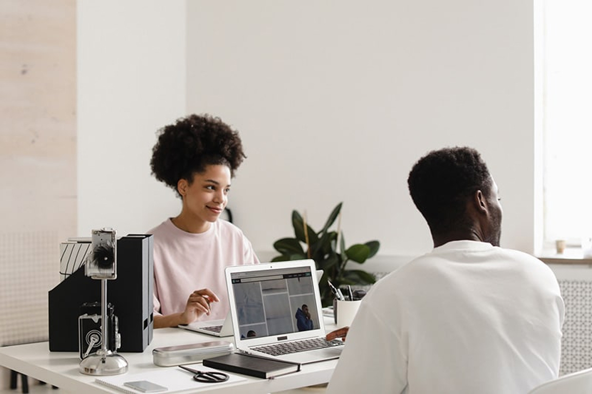 Two people in a meeting