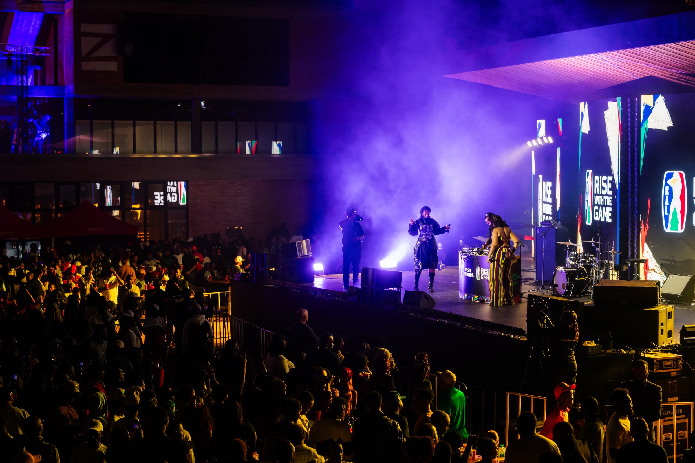 Performer on stage during a live show at Zaria Court Kigali