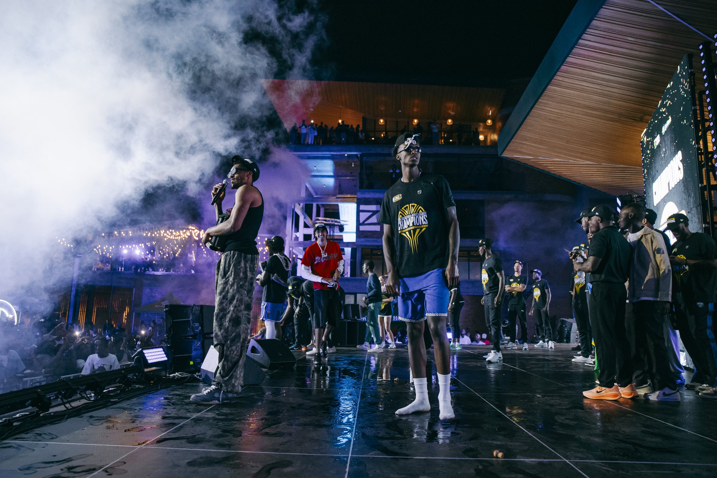Performers on the court during a night event at Zaria Court Kigali
