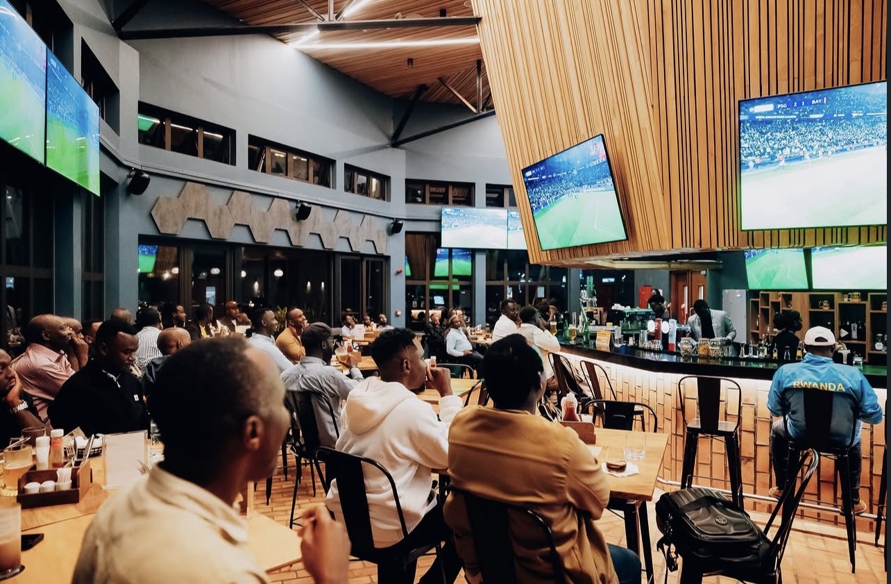 Guests watching a football match on the screens inside the sports bar at Zaria Court Kigali