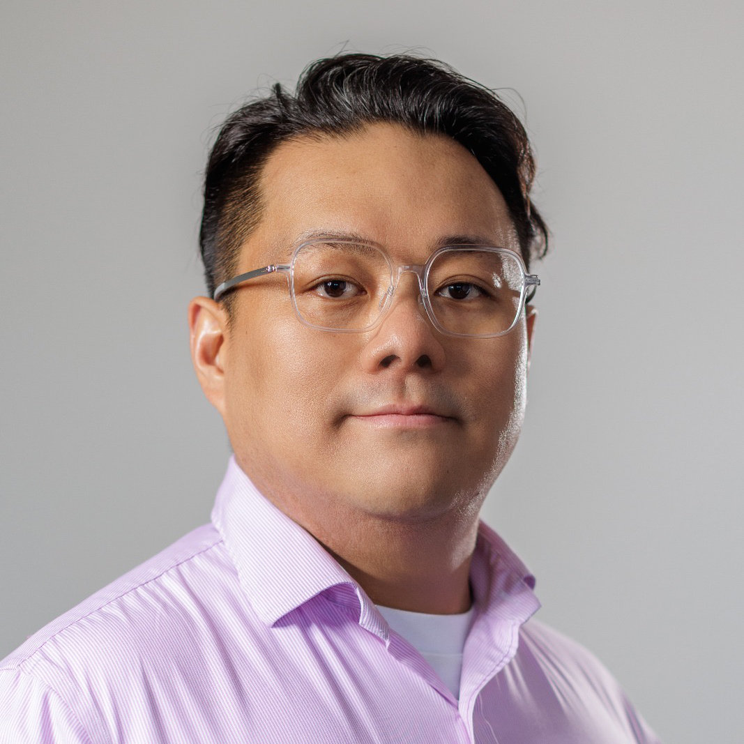 Headshot of Tim Yuen 袁梓峰, a Registered Provisional Psychologist.