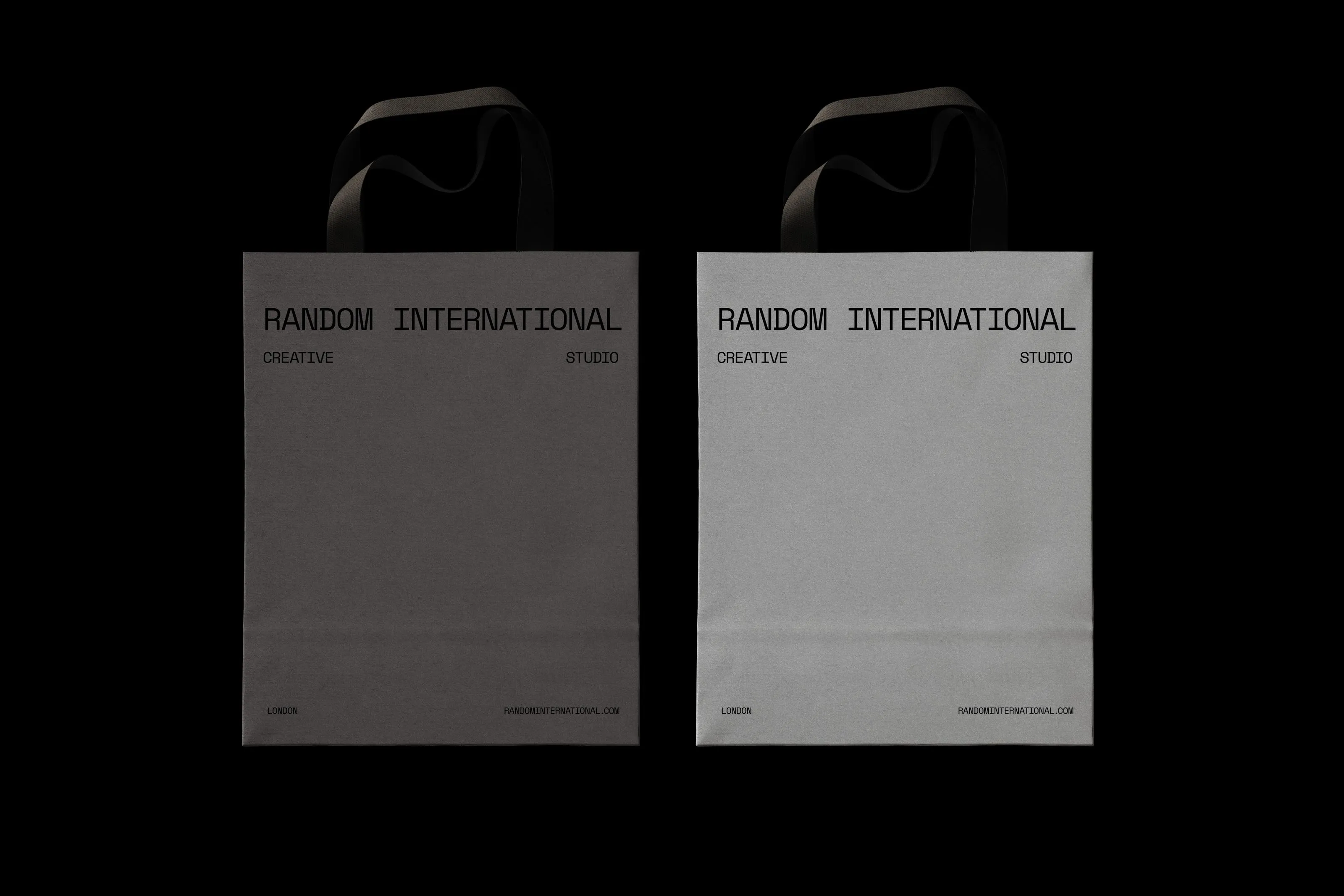 Image of two paper shopping bags for Random International