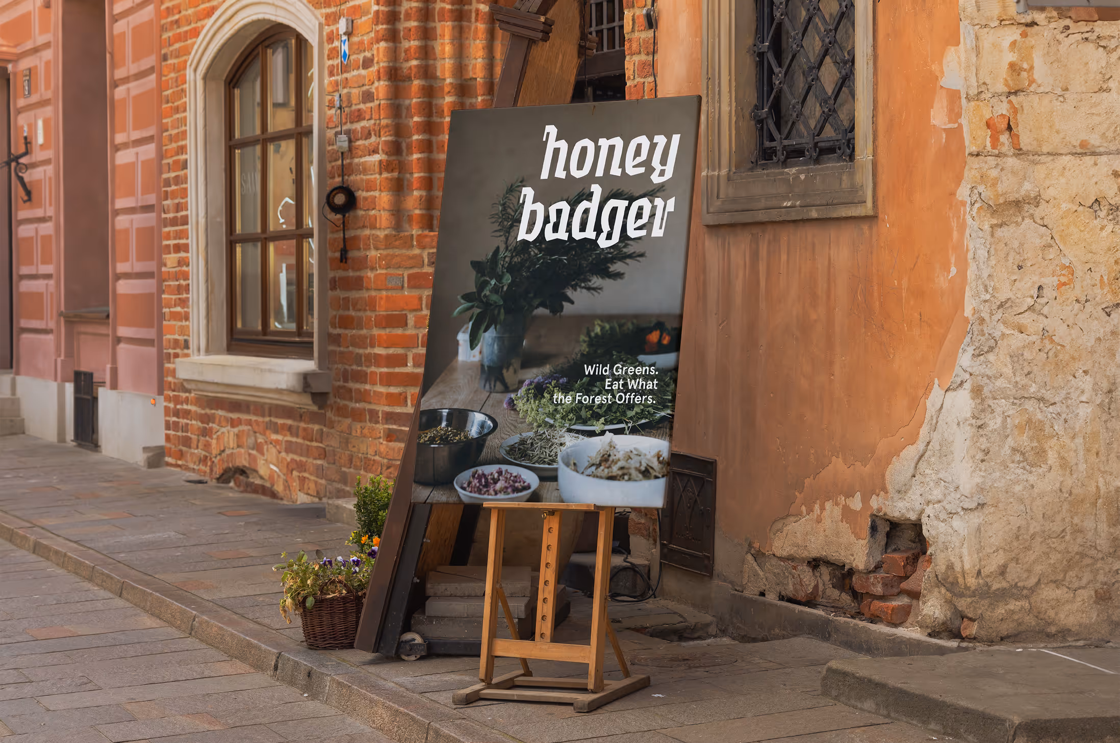Poster for Honey Badger restaurant with the tagline: “Wild Greens. Eat What the Forest Offers.”