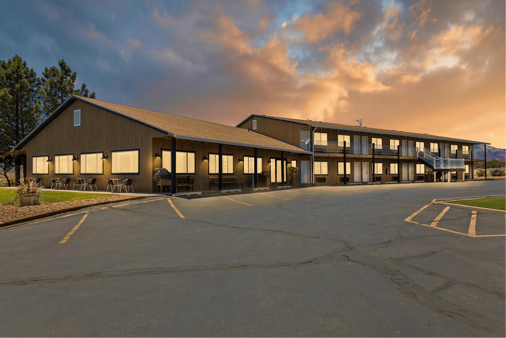 Exterior of Broken Spur Inn & Steakhouse at sunset near Capitol Reef National Park