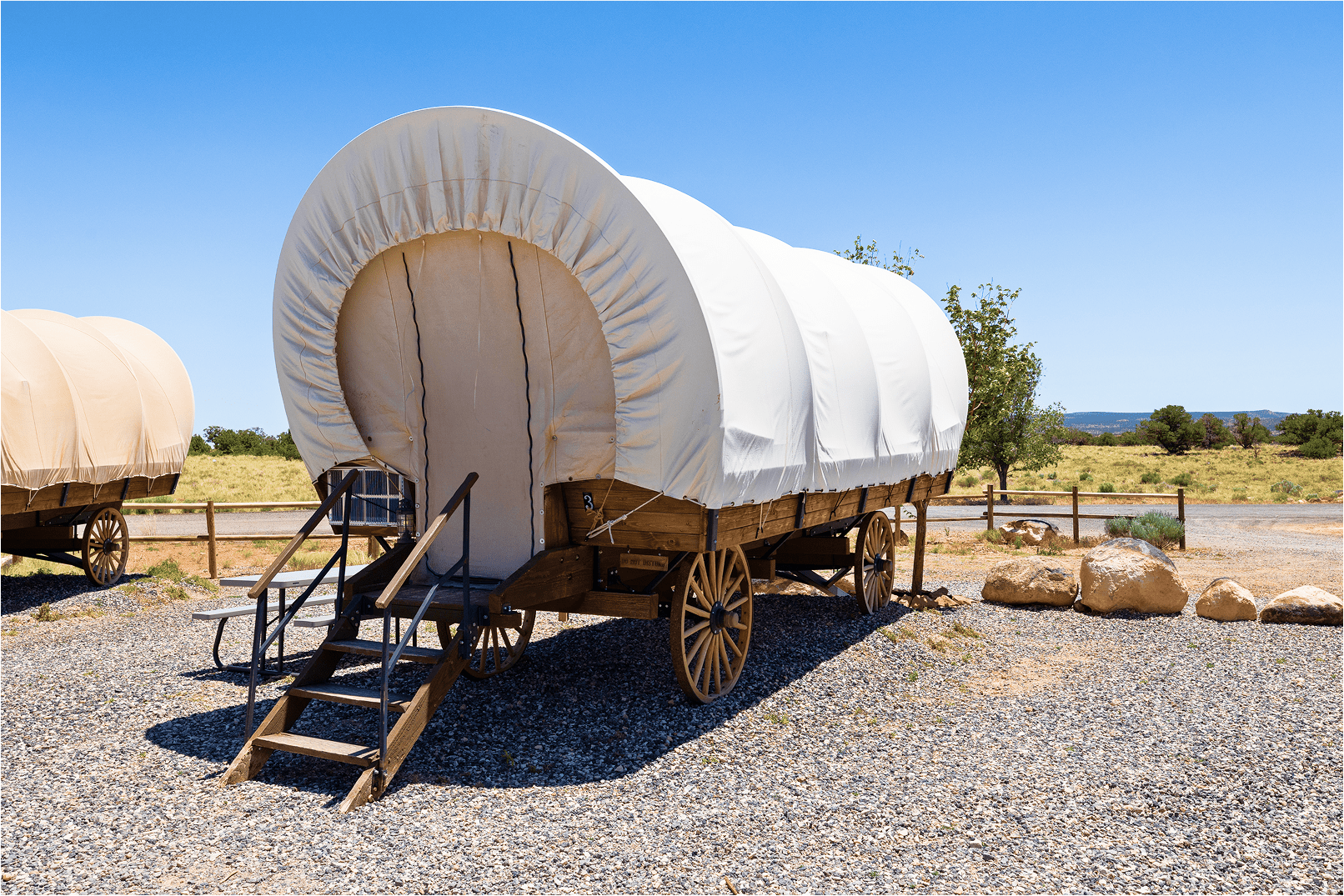 Front entrance of Conestoga wagon lodging at Broken Spur Inn & Steakhouse in Torrey Utah