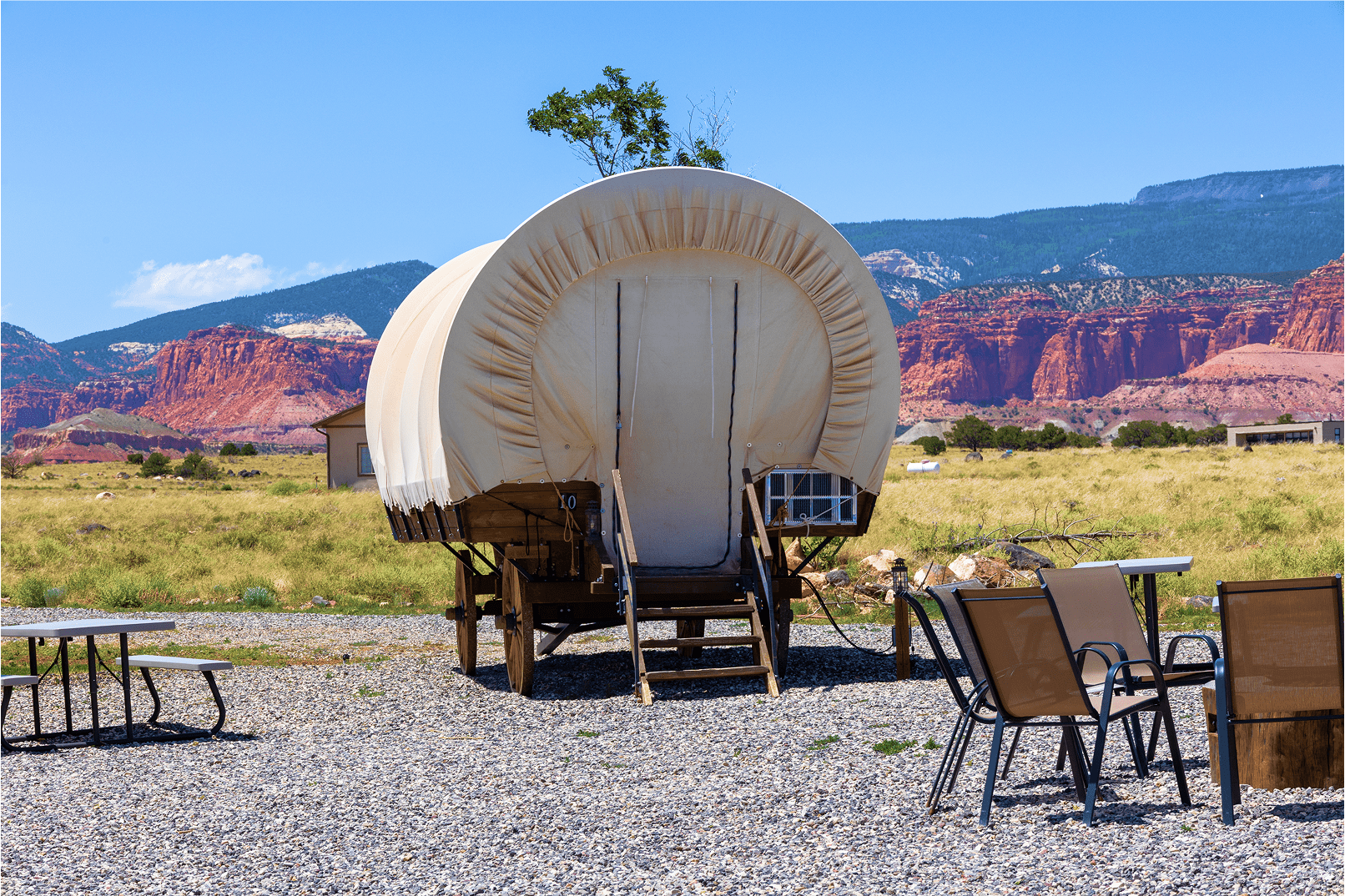 Conestoga wagon lodging at Broken Spur Inn & Steakhouse overlooking Capitol Reef red rock views