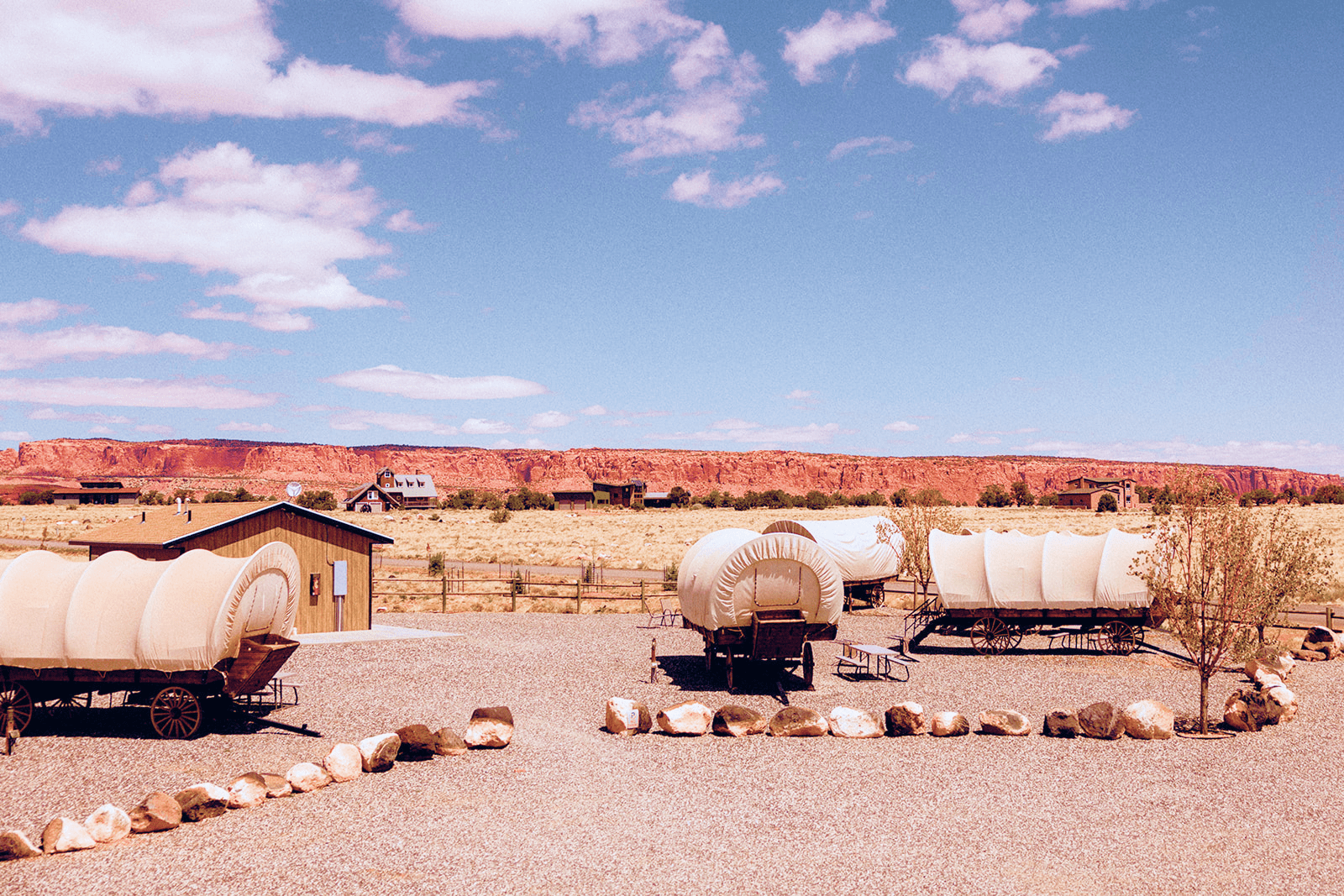 Wagon lodging circle overlooking Capitol Reef scenery at Broken Spur Inn & Steakhouse