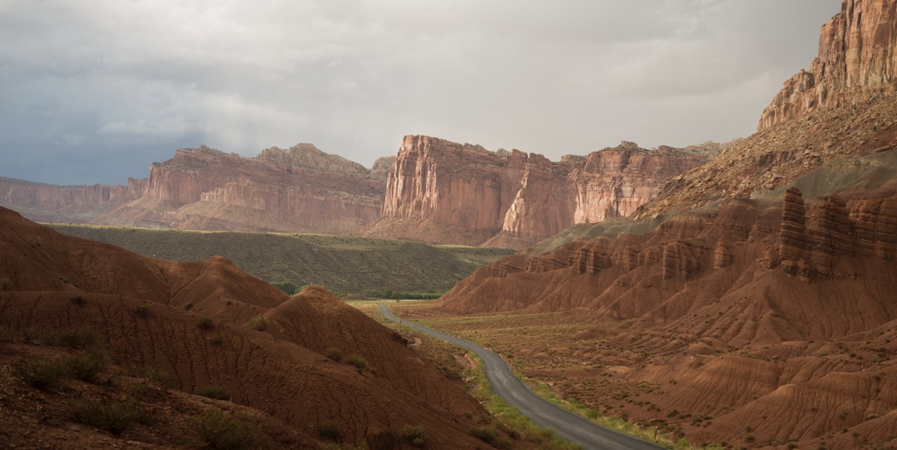 Expansive view of Capitol Reef National Park showcasing mesas, open desert, and distant red rock formations near Torrey, Utah.