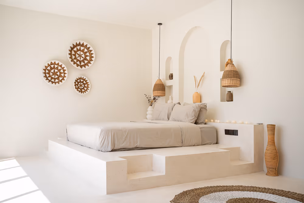 Bedroom at Villa Kasih with arched decor and natural light