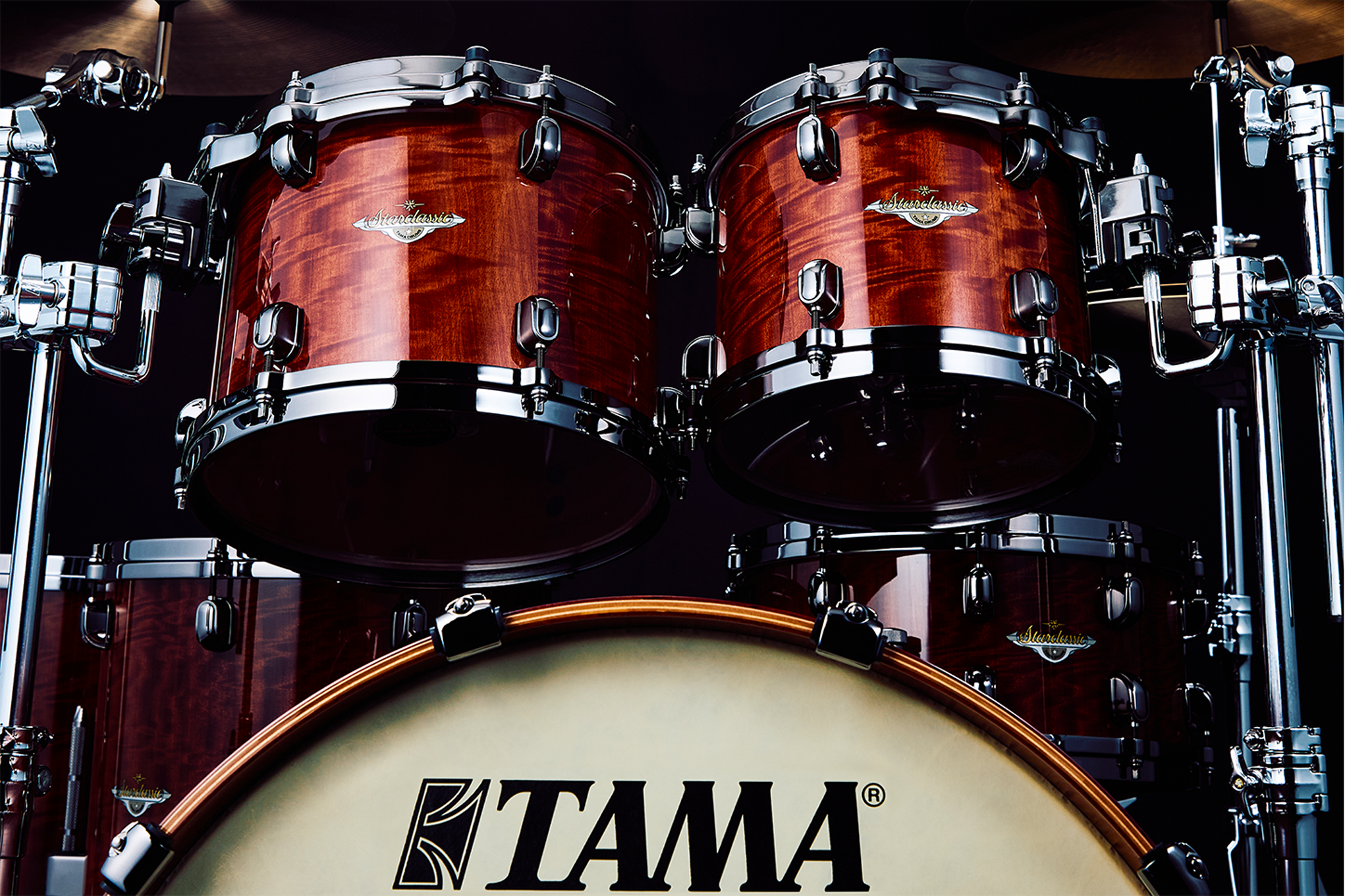 Elegant design: African cherry wood & black nickel hardware.