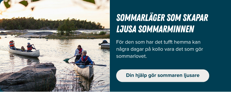 Four people paddling canoes on a calm lake near rocky shoreline at sunset.
