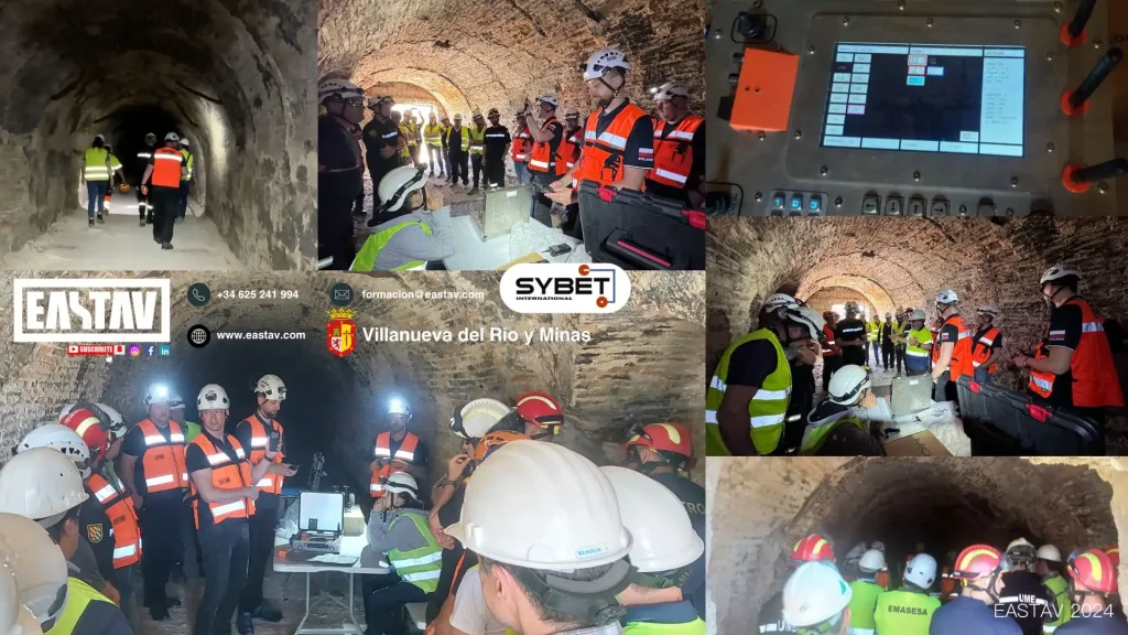 Construction workers and inspectors in hard hats conducting underground tunnel and mining site survey.