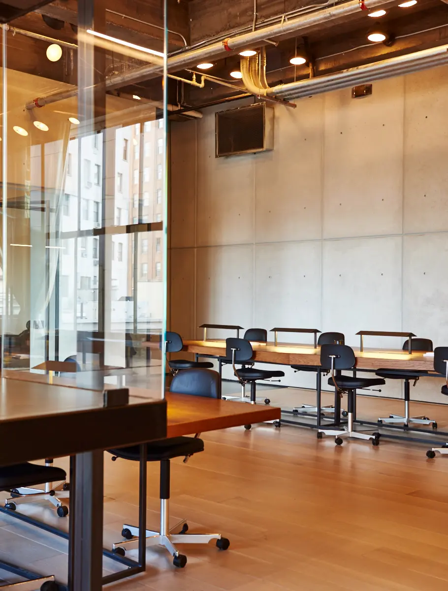 Collaborative workspace at Spring Place with home-like interiors and creative setup