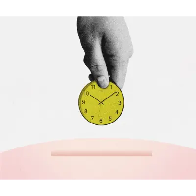 A hand dropping a yellow clock into a pink ballot box.